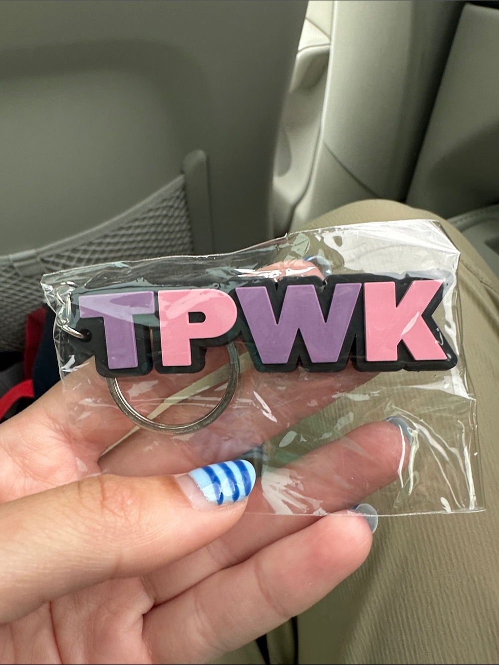 Harry Styles Treat People with Kindness keychain from NYC 2026 Pop-up